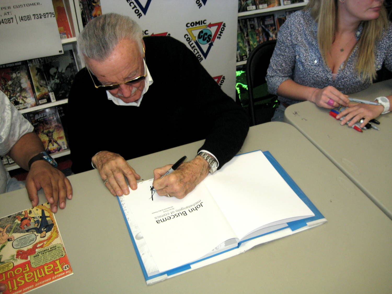 Stan Lee signing my book, in Brian Peck's Take a Picture Comic Art